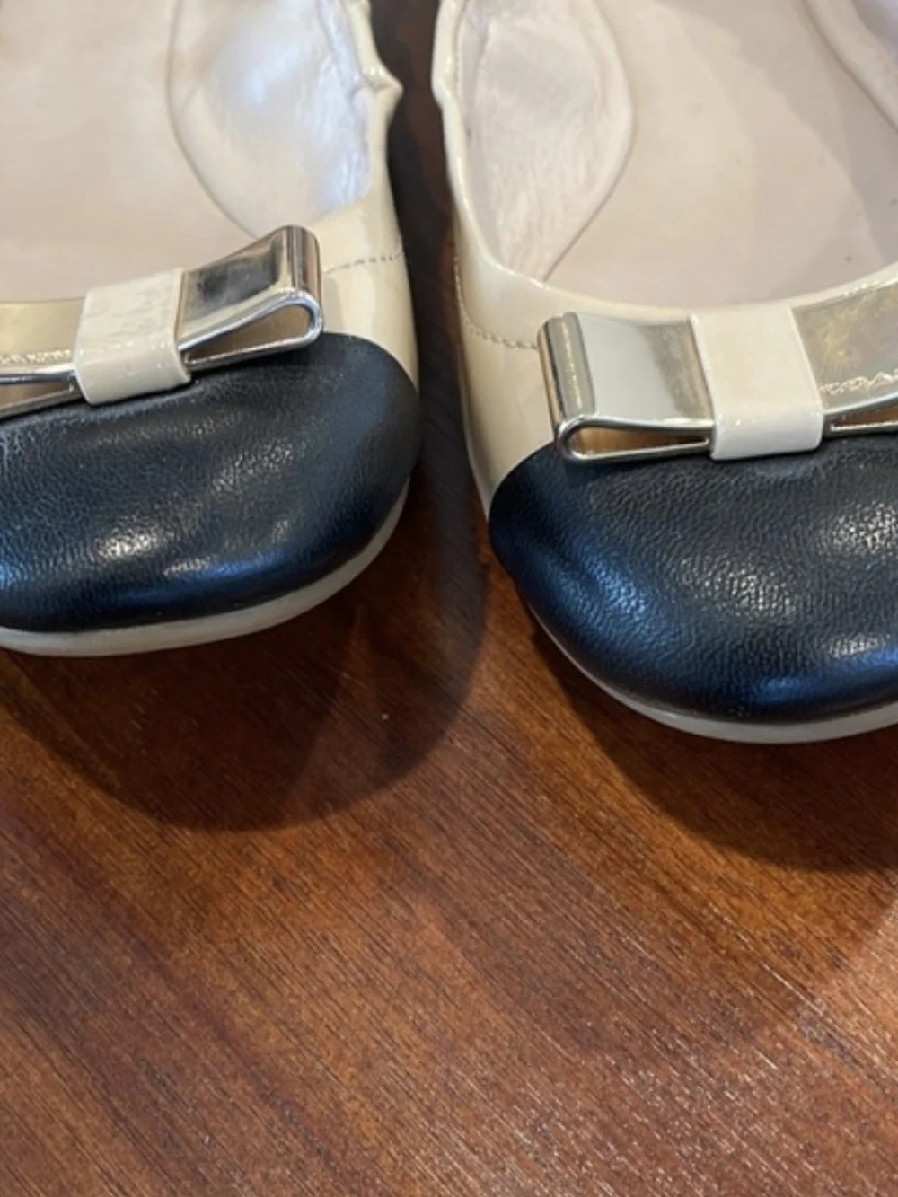 Coach Two-Tone Patent Bow Cap-Toe Ballet Flats in Beige and Black
